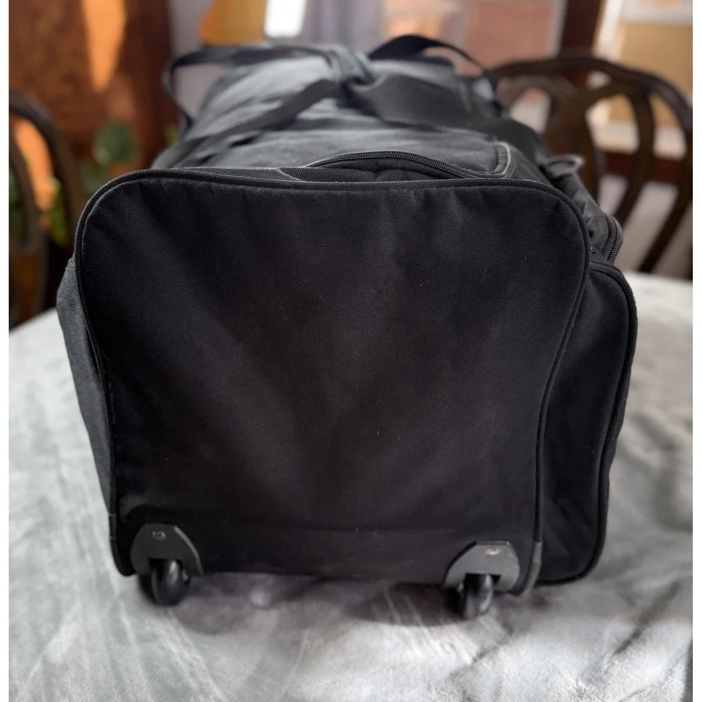 Wilson Black Rolling Duffel Bag Large Wheeled Travel Luggage Sports Gear